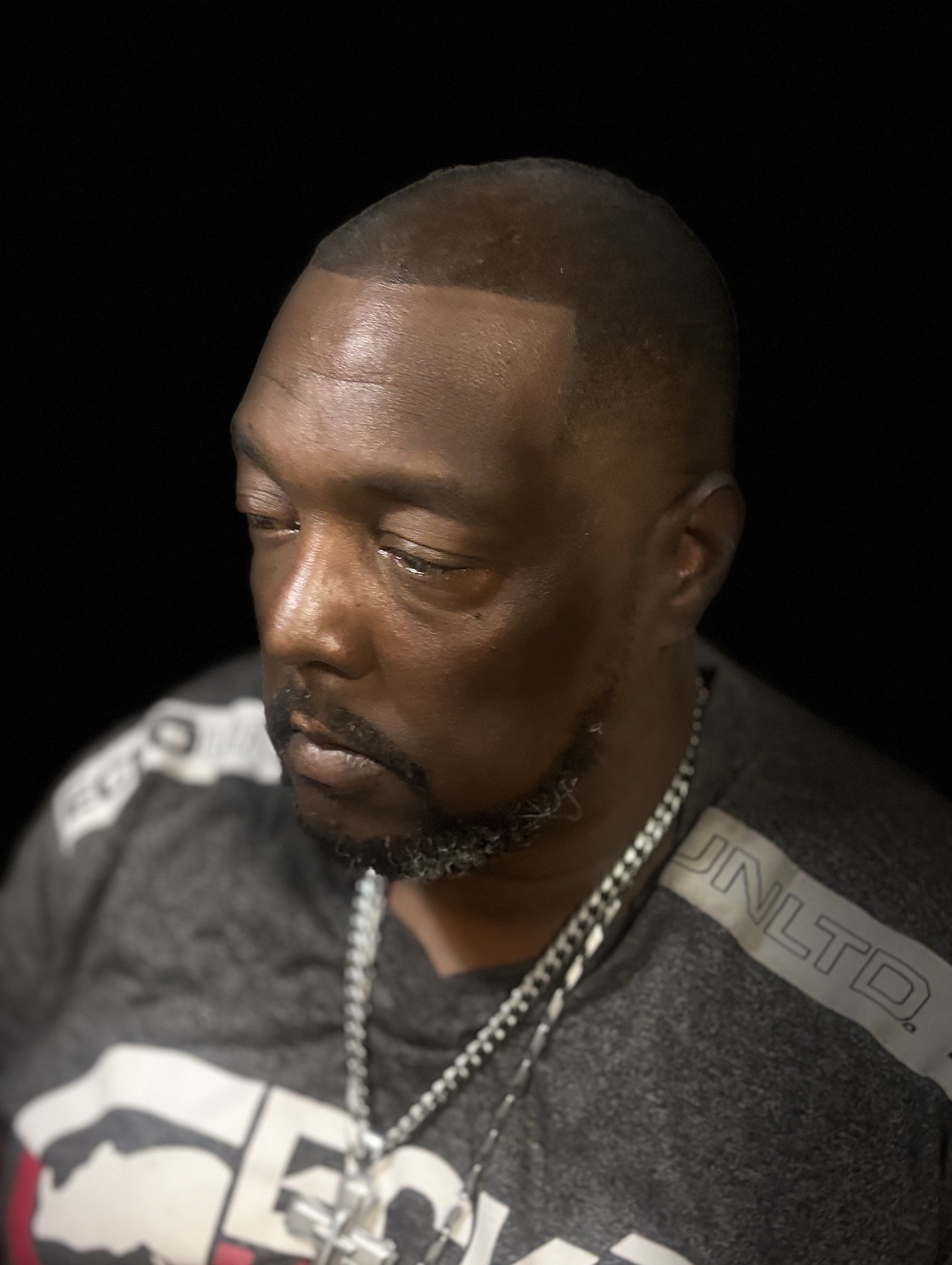 Short haircut with a shaped beard at Hood Cuttz